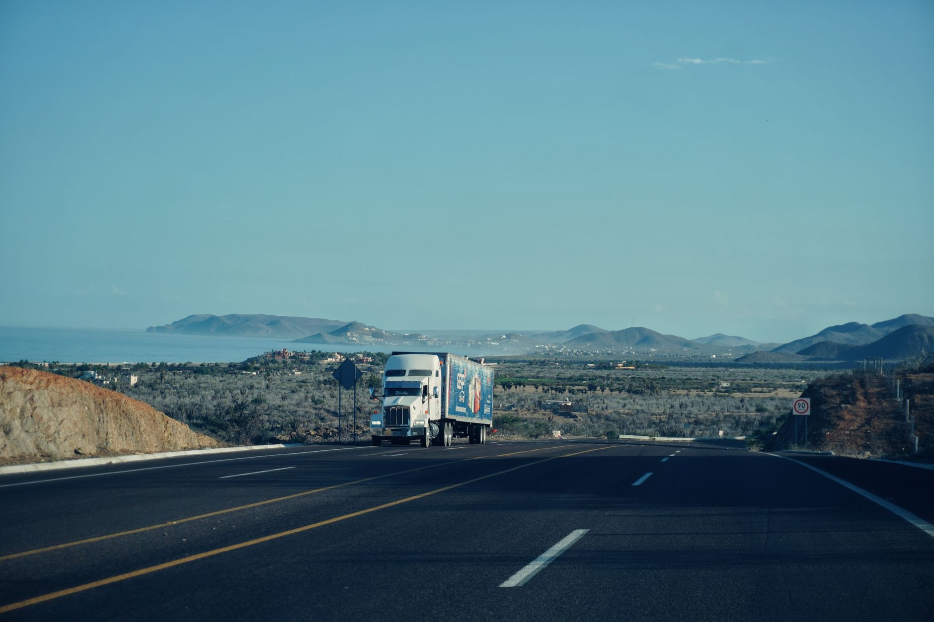 A semi truck on an open highway